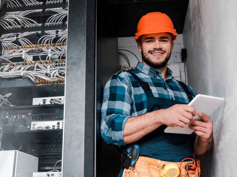 guy working in a server room